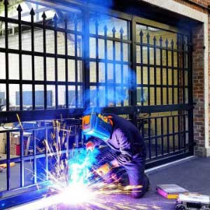 جوشکاری و آهنگری درب پارکینگ غرب تهران